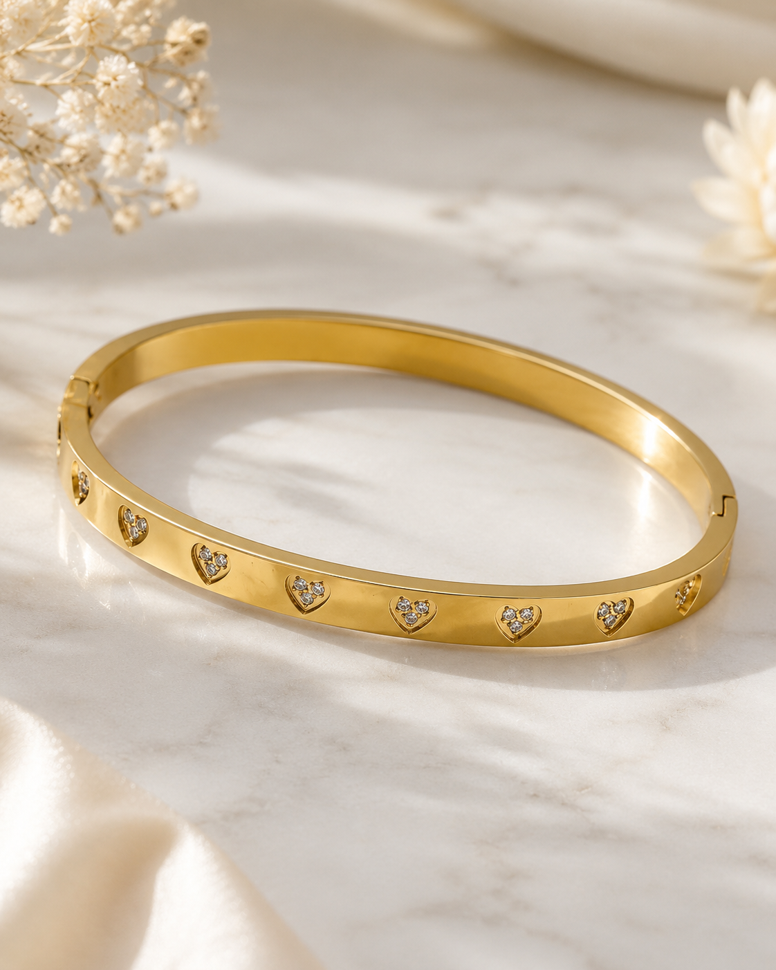 Amour luxe: 18K gold plated diamanté heart bangle
