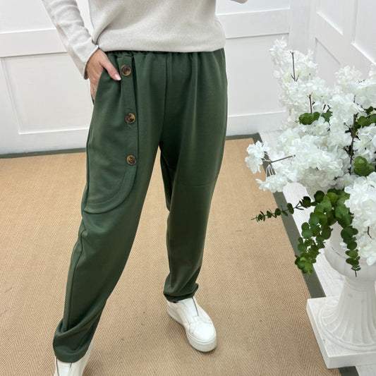 Monroe: Khaki stretchy button trousers. One size: 12-18