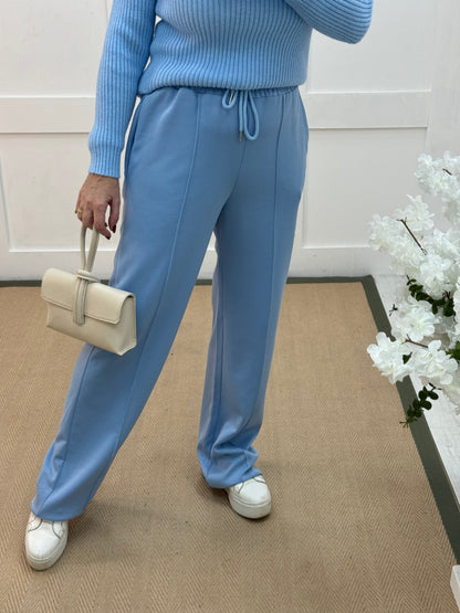 Trudy: Baby blue stretchy wide leg pocket trousers. One size: 10-16