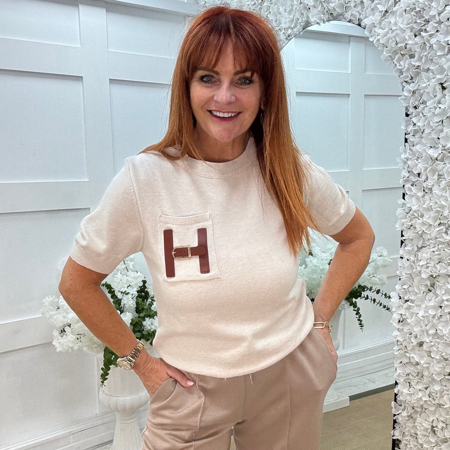 Harley: Cream H logo knit top. One size: 10-16