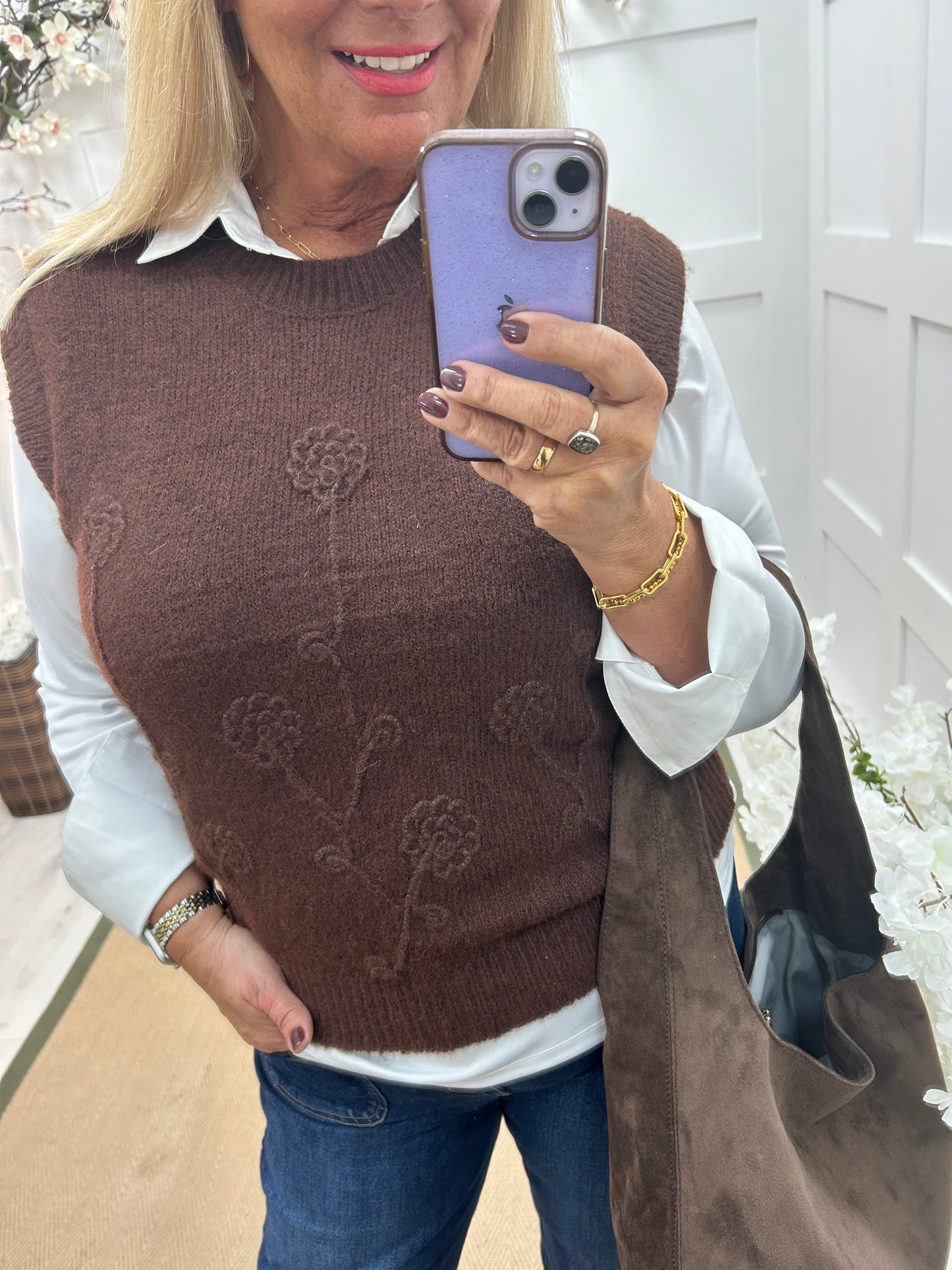 Larry: Brown sleeveless tank top with flower detail. One Sz: 12-18