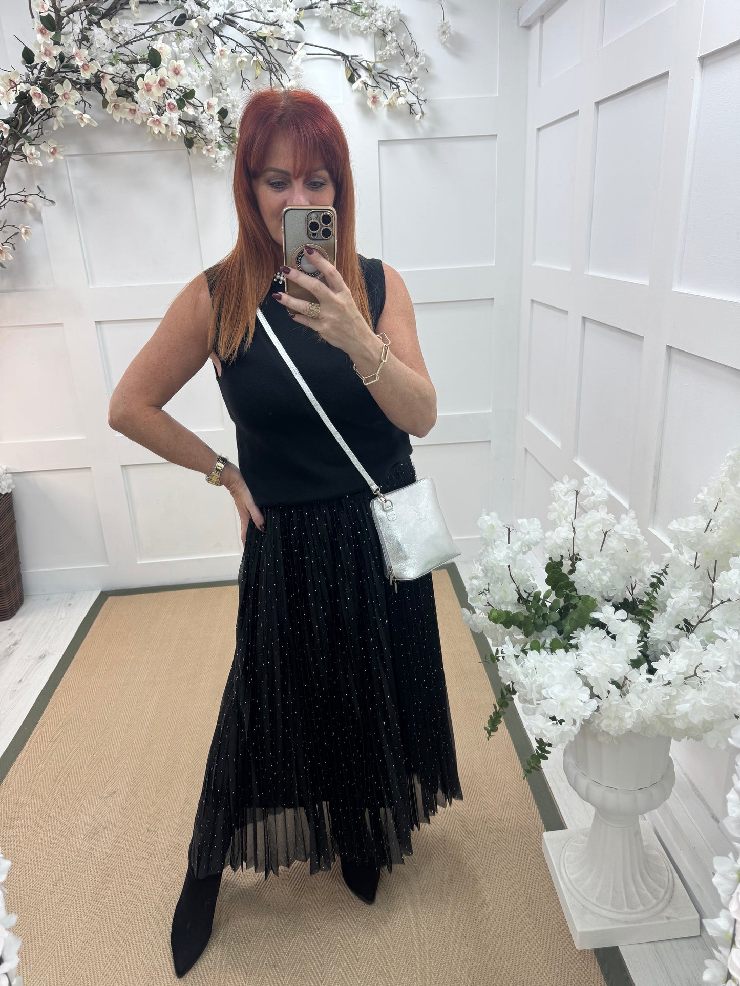 Raven: Black rhinestone sleeveless top. One size: 12-16