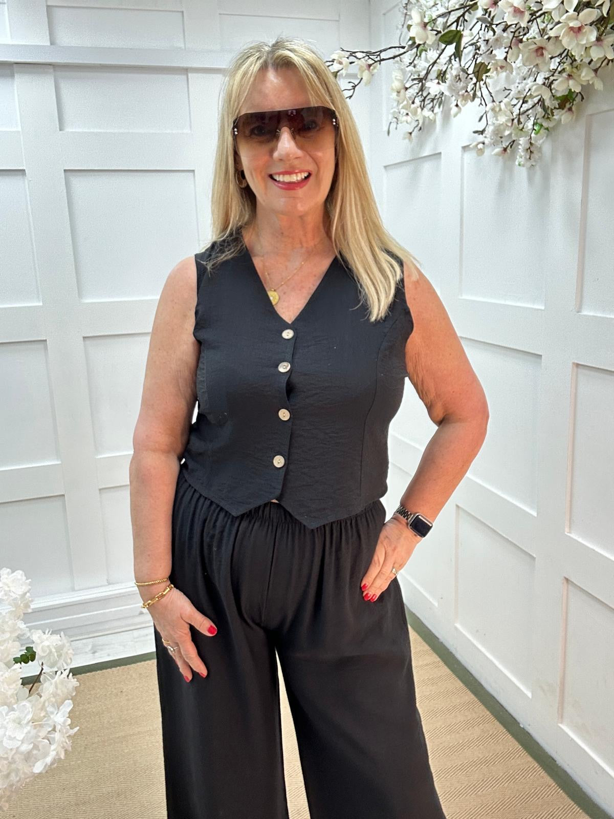 Cody: Black waistcoat two piece trouser set. One size: 12-16