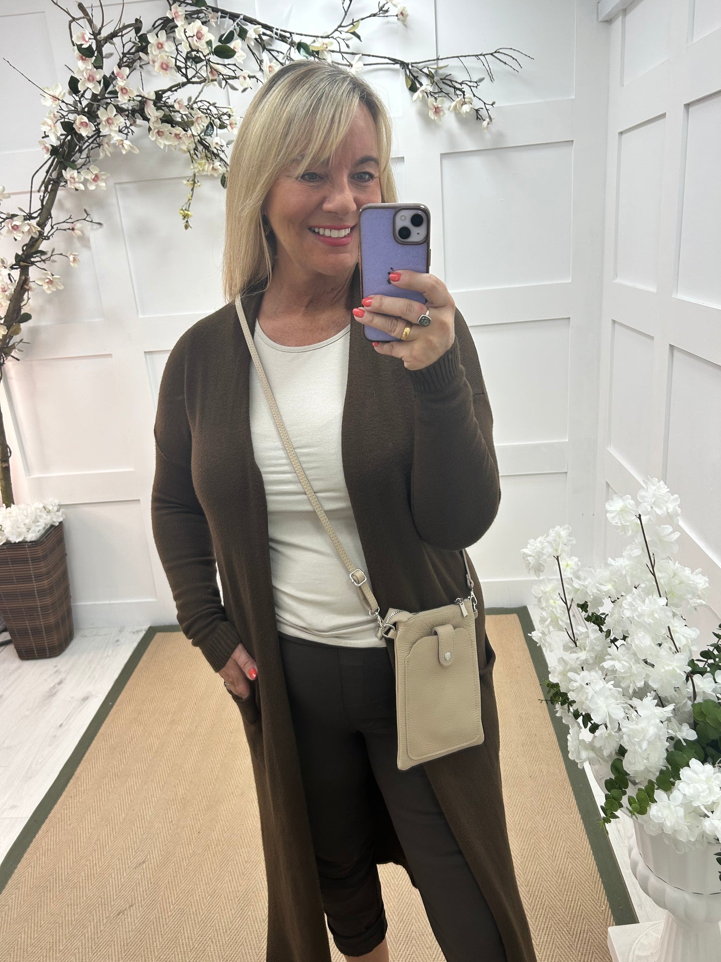 Marley: Brown plain longline pocket cardigan. One size: 12-18