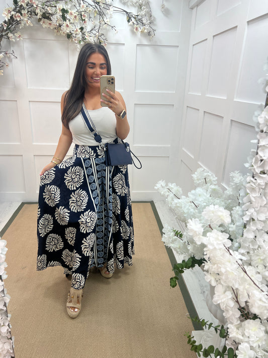 Tamara: Navy & cream abstract floral printed trousers. 2 sizes.