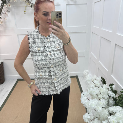 Devon: Black tweed button waistcoat. One size: 8-12