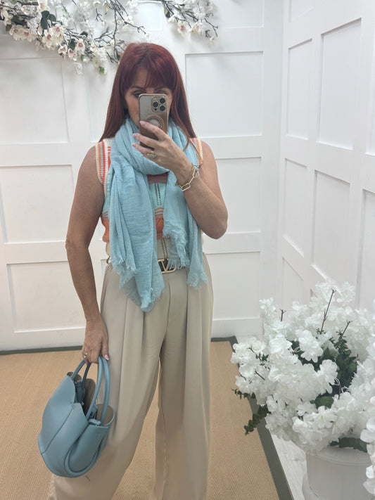 Tula: Powder blue long frayed raw edge scarf. One size