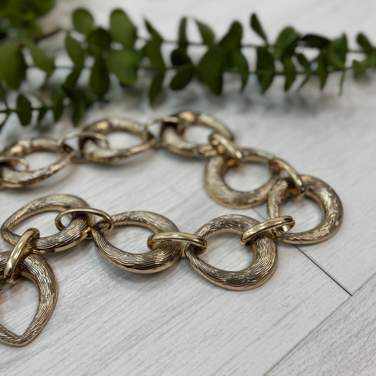 Fallon: Gold chain belt. One size: 8-18
