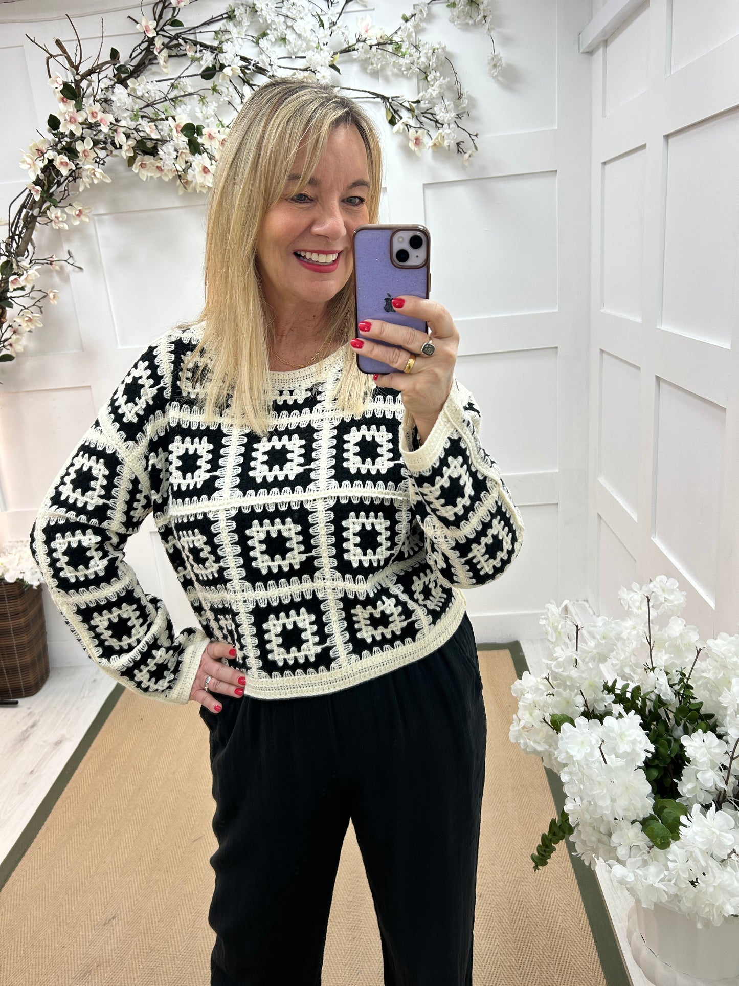 Carly: Black and cream long sleeve crochet top. One size: 14-18