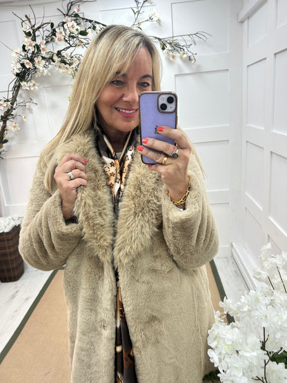 Madeleine: Beige long faux fur coat . One size 12-18