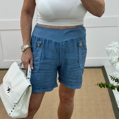 Brogan: Blue Made in Italy linen shorts. Sizes: 12-18
