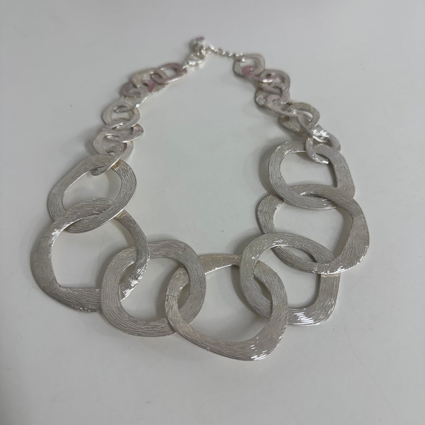 Shona: Silver metal rings statement necklace