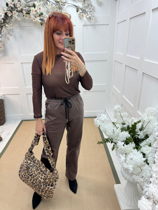 Romy: Brown sheer mesh top. One Sz: 12-18