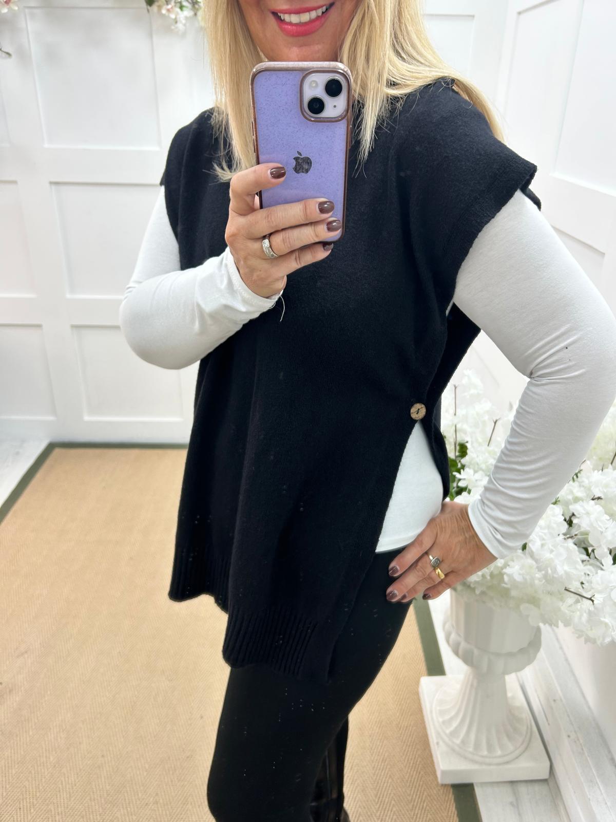 Phoenix: Black button knit top. One size: 14-20