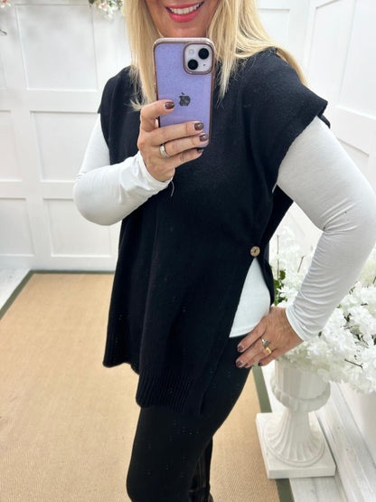 Phoenix: Black button knit top. One size: 14-20