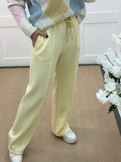 Trudy: Lemon stretchy wide leg pocket trousers. One size: 10-16