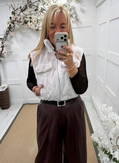 Georgie: Faux fur gilet with chest pockets. One size: 10-16. 2 colours