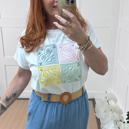 Sophie: White embroidered blue heart T shirt. One size 14-18
