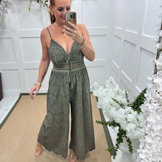 Bria: Khaki broderie Anglaise strappy jumpsuit. One size: 10-14