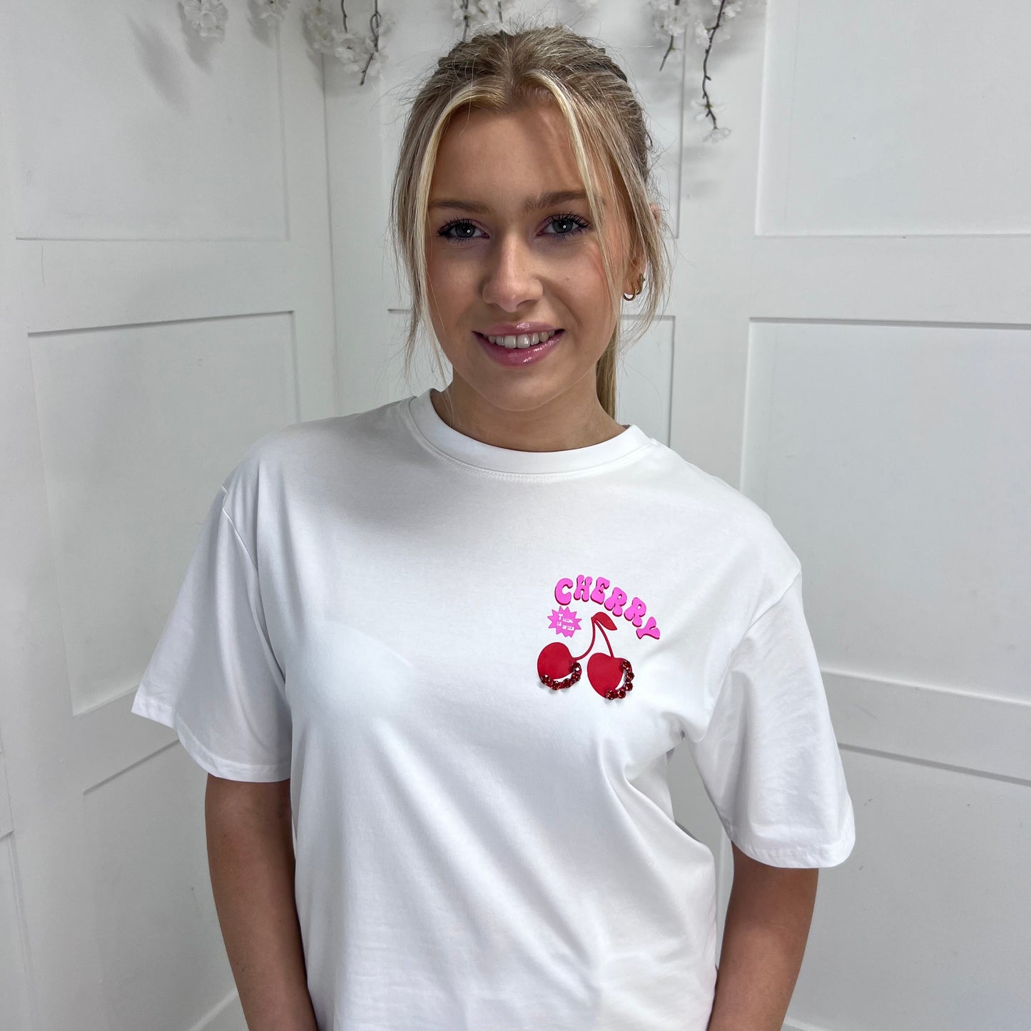 Chloe: White rhinestone cherry T shirt. 2 sizes