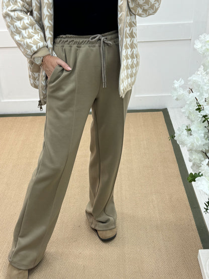 Trudy: Stone stretchy wide leg pocket trousers. 2 sizes