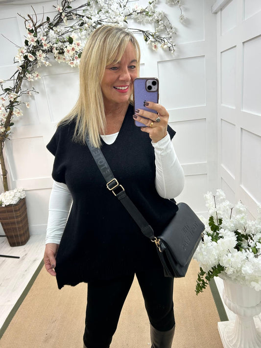 Phoenix: Black button knit top. One size: 14-20