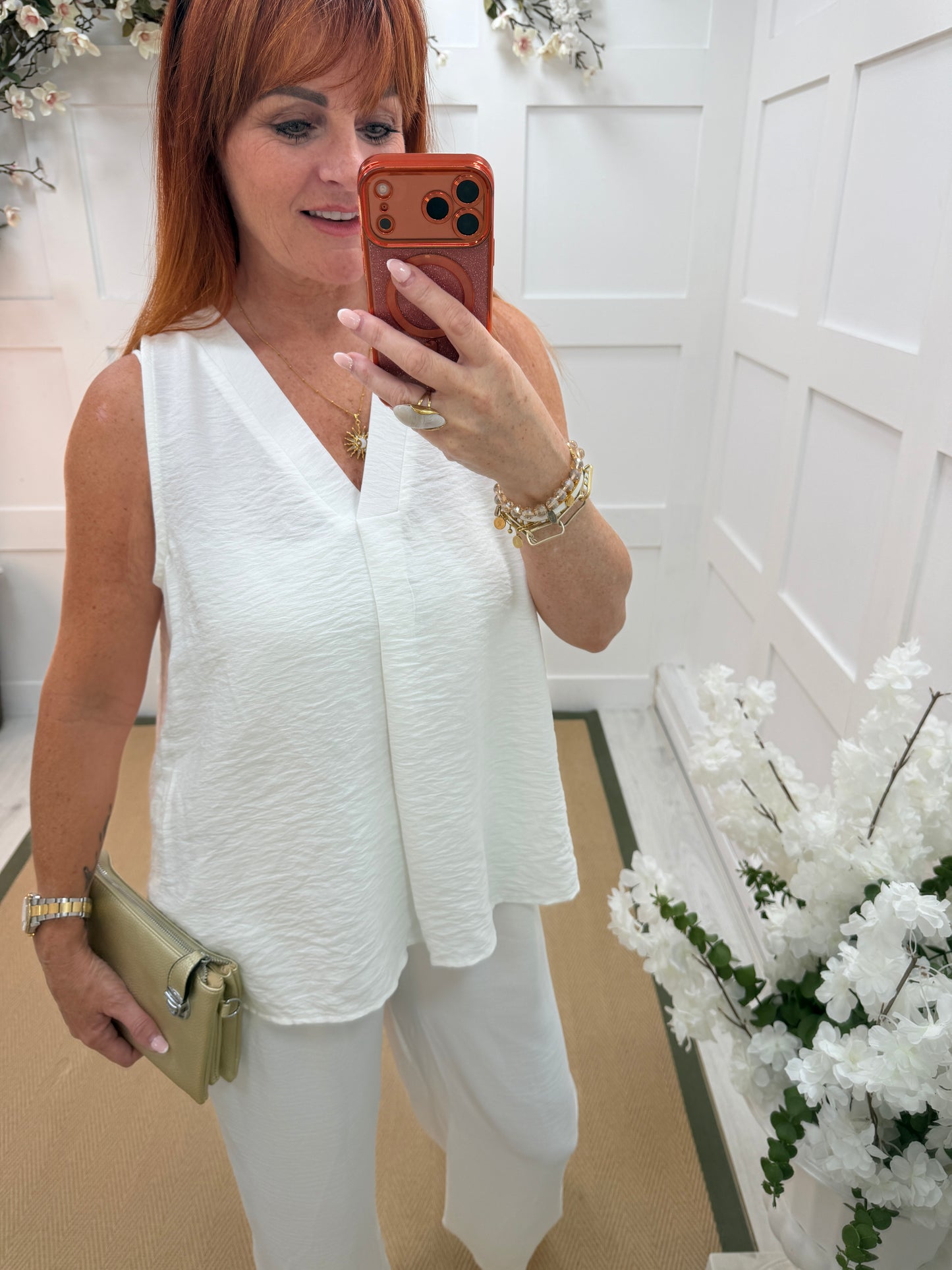 Valerie: V neck sleeveless vest. One size: 12-16. 2 colours