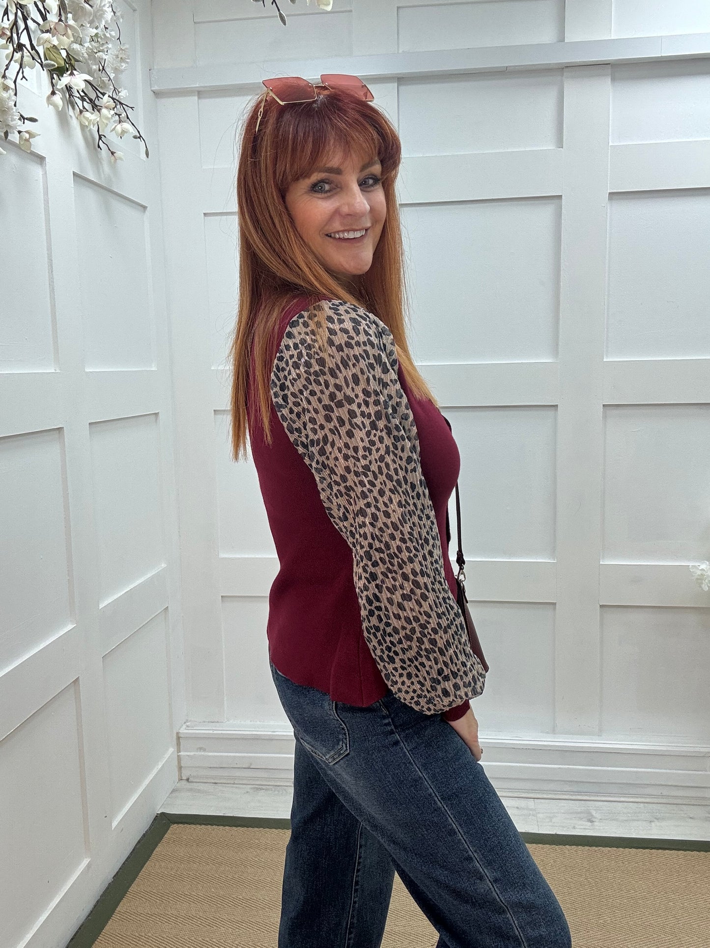 Carol: Burgundy leopard print sleeve fitted top. One size 10-14