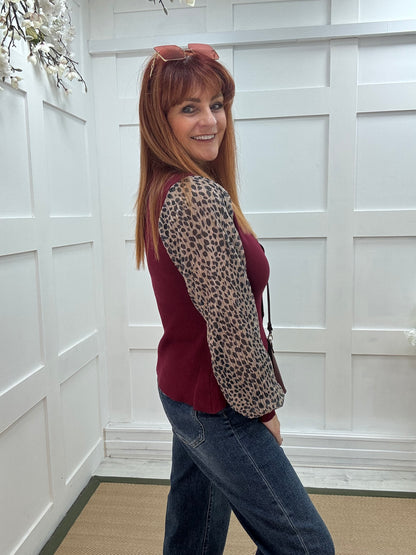 Carol: Burgundy leopard print sleeve fitted top. One size 10-14