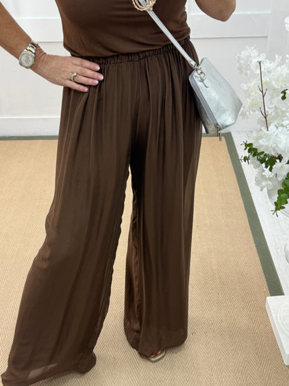 Venice: Brown silk wide leg trousers. One size: 12-20