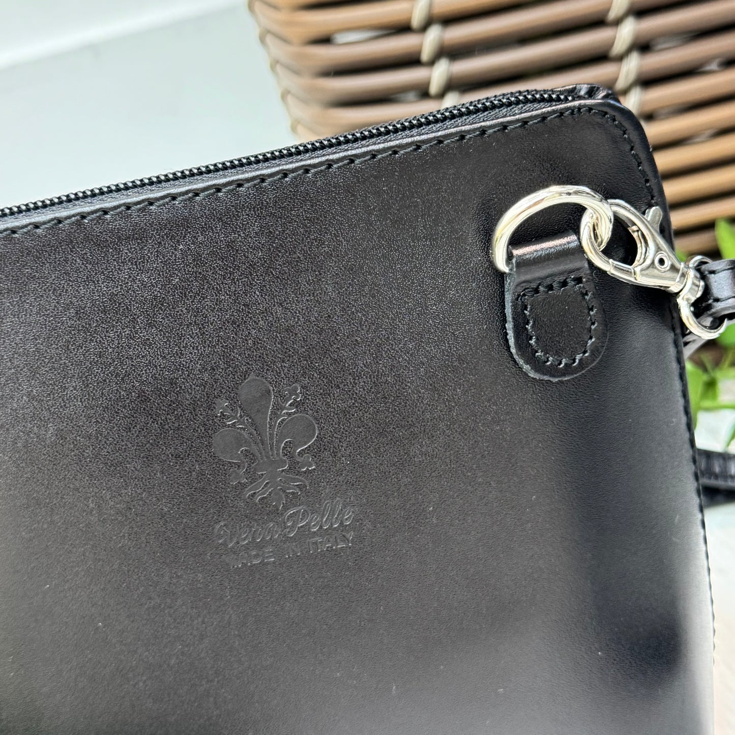Thea: Black leather cross body/clutch bag.