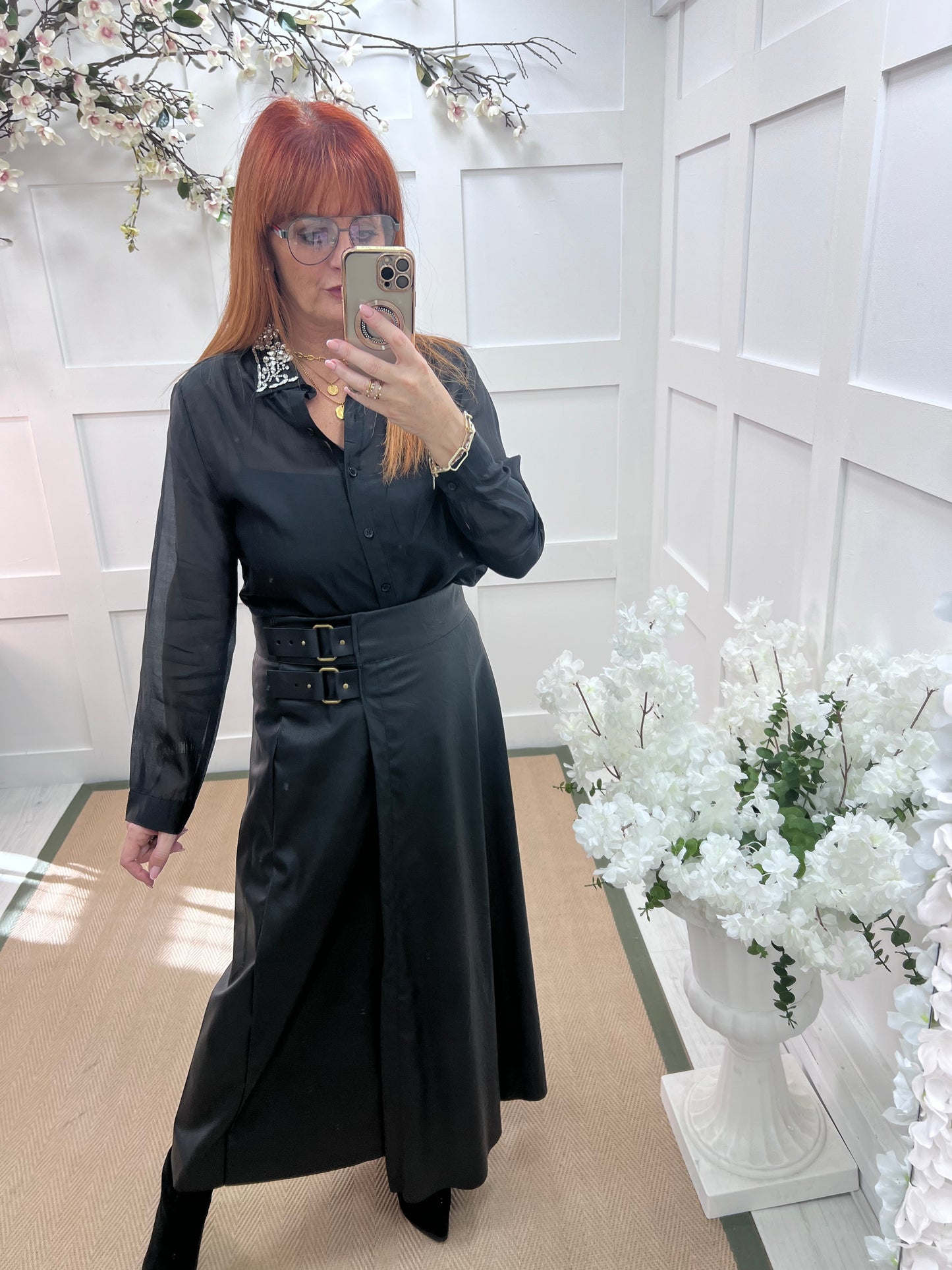 Raine: Black faux leather belted asymmetric skirt. One size: 12-16