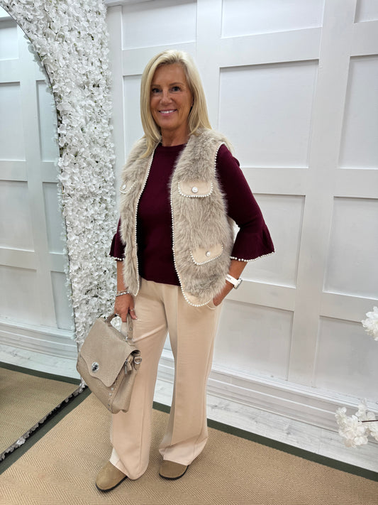 Krista: Stone faux fur pearl waistcoat. One size: 10-14