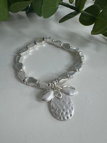 Shana: Silver metal charm bracelet
