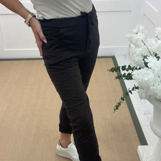 Marnie: Stretchy brown magic trousers with rear pockets. 3 Sizes: 10-22