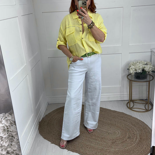 Gina: White wide leg stretchy jeans. Sizes: 10-20