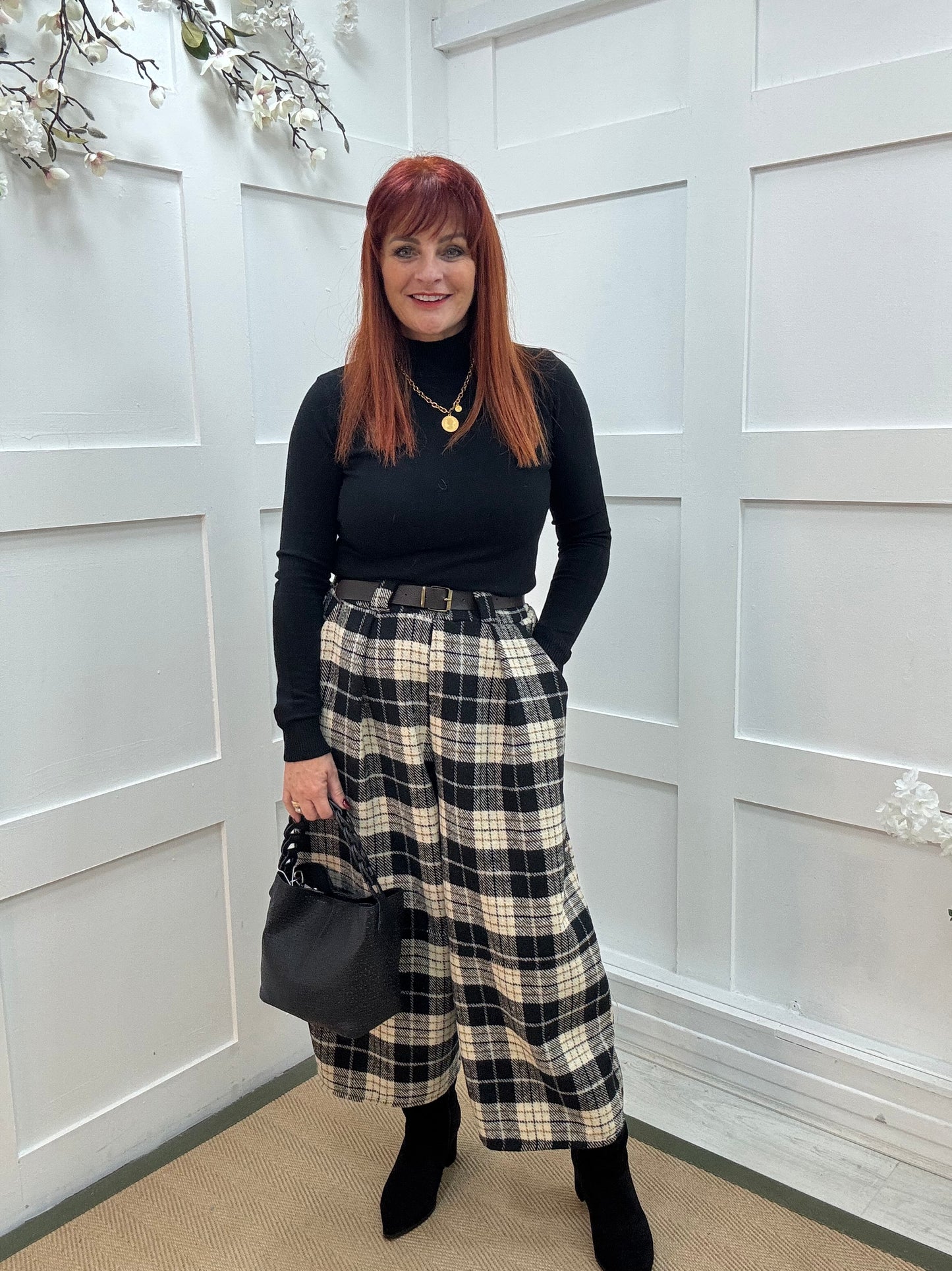 Billie: Black high neckline plain top. Two sizes.