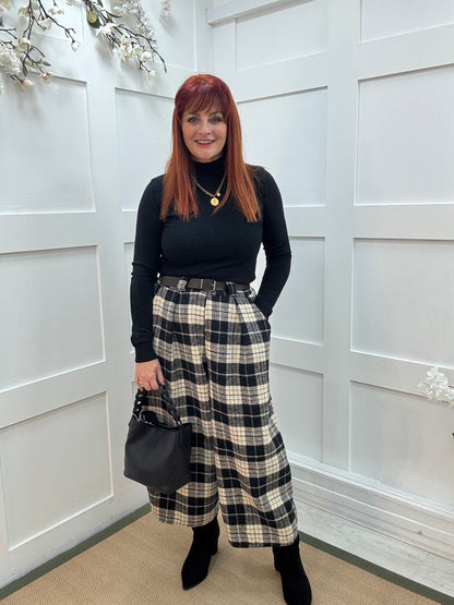 Billie: Black high neckline plain top. Two sizes.