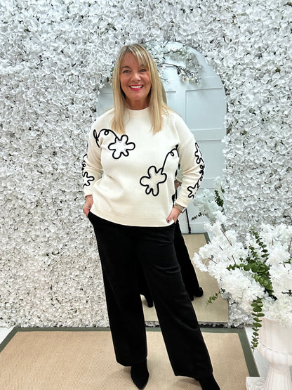 Dahlia: Cream embroidered sequin knit. One size: 12-18