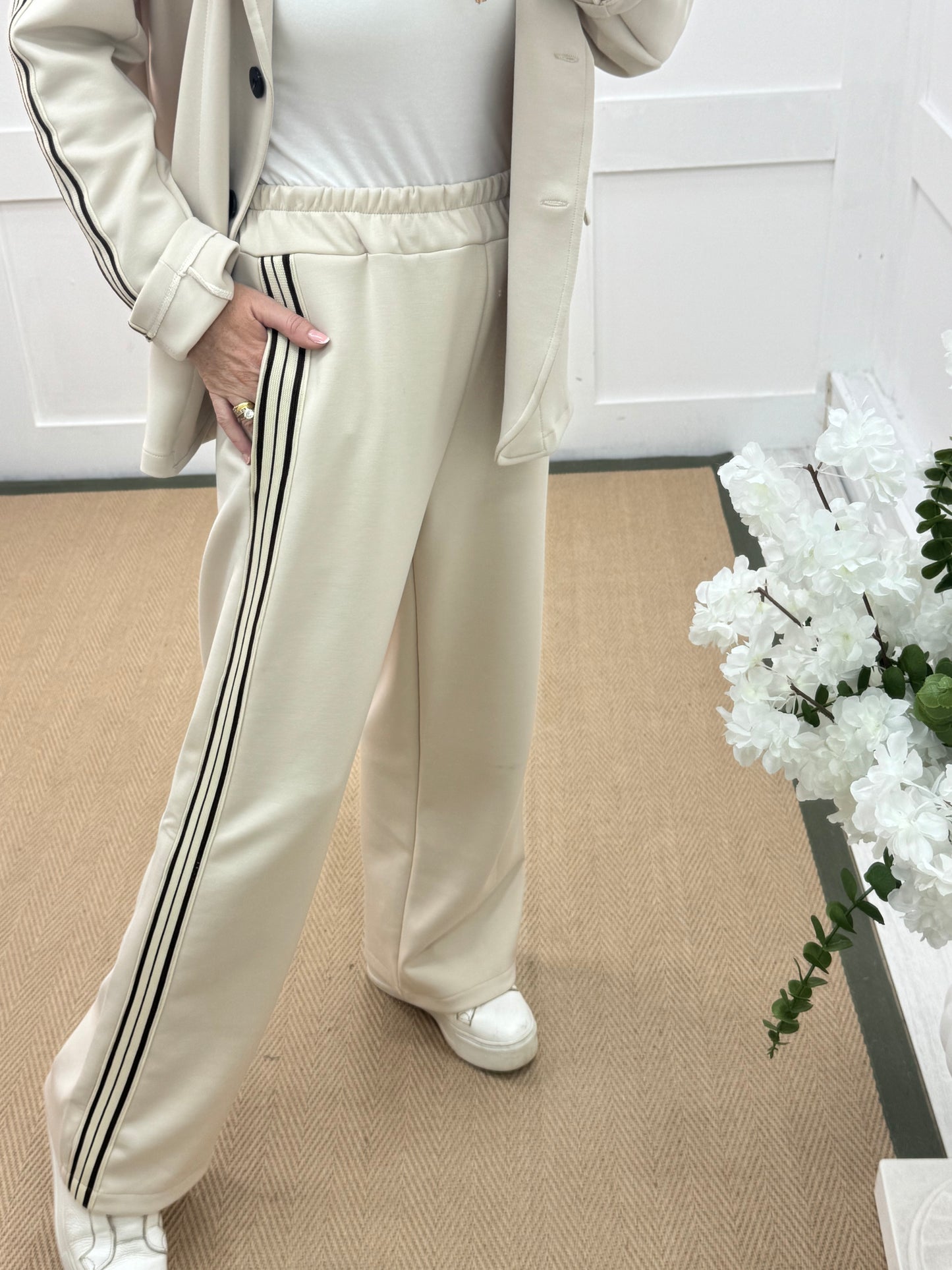 Libby: Cream stretchy sports stripe trousers. One size: 12-16