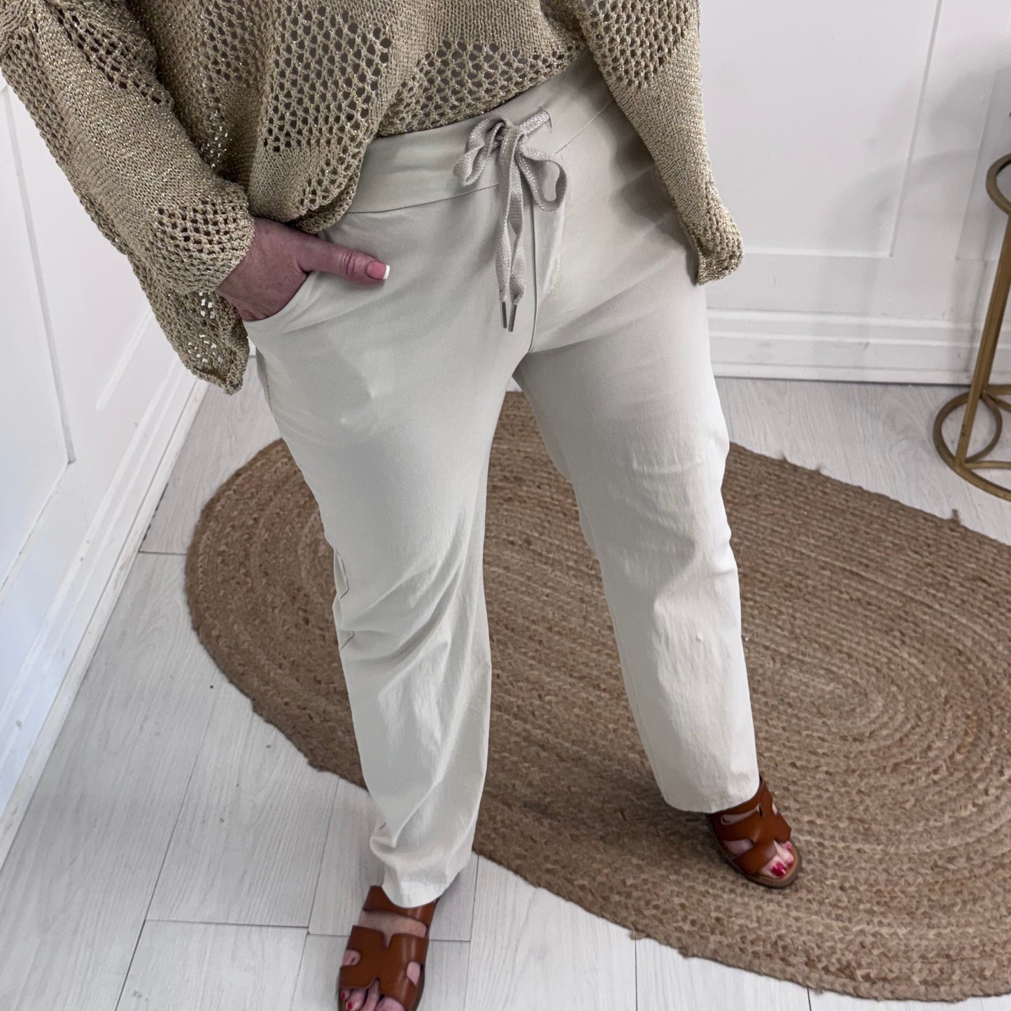 Maeva: Cream straight leg magic pants. One size: 10-14