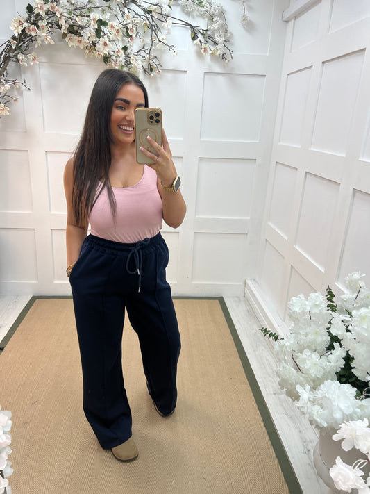 Abigail: Stretchy baby pink basic vest top. 2 sizes