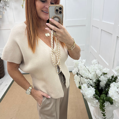 Sammi: Cream V neck gold button top. One size: 10-16