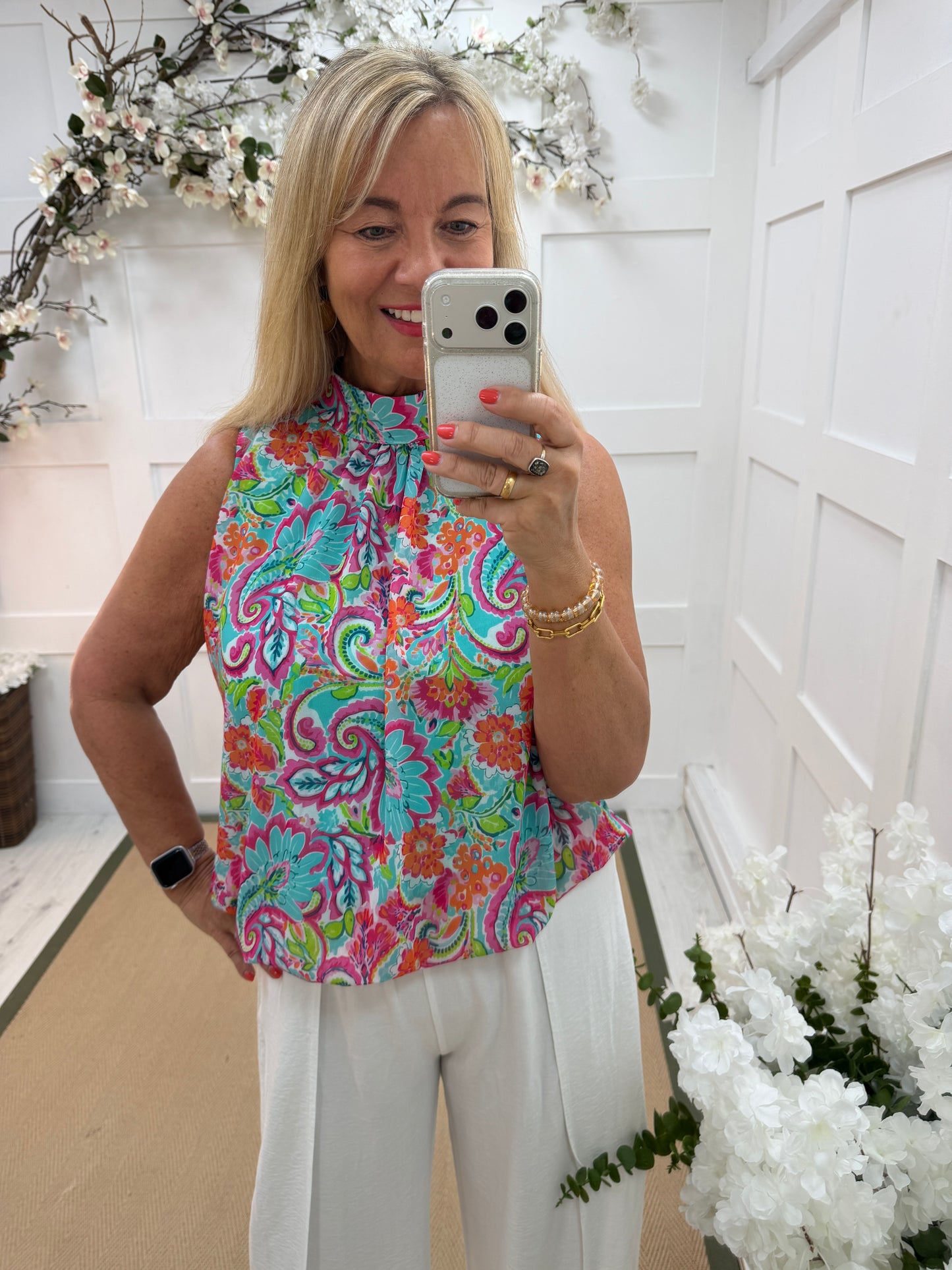 Kendall: Sleeveless high neck floral printed top. One Sz: 10- 18
