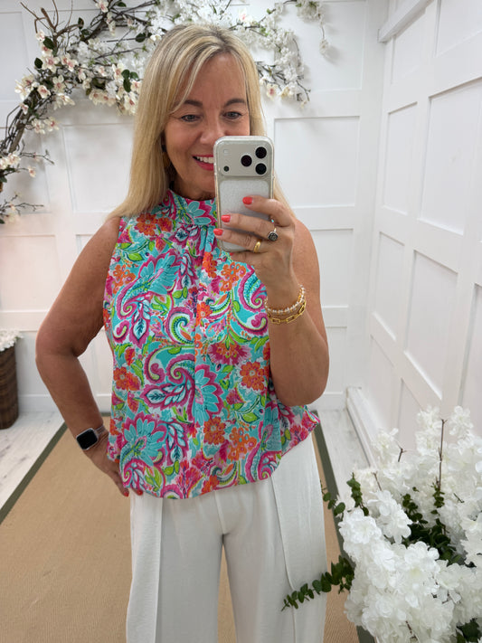 Kendall: Sleeveless high neck floral printed top. One Sz: 10- 18