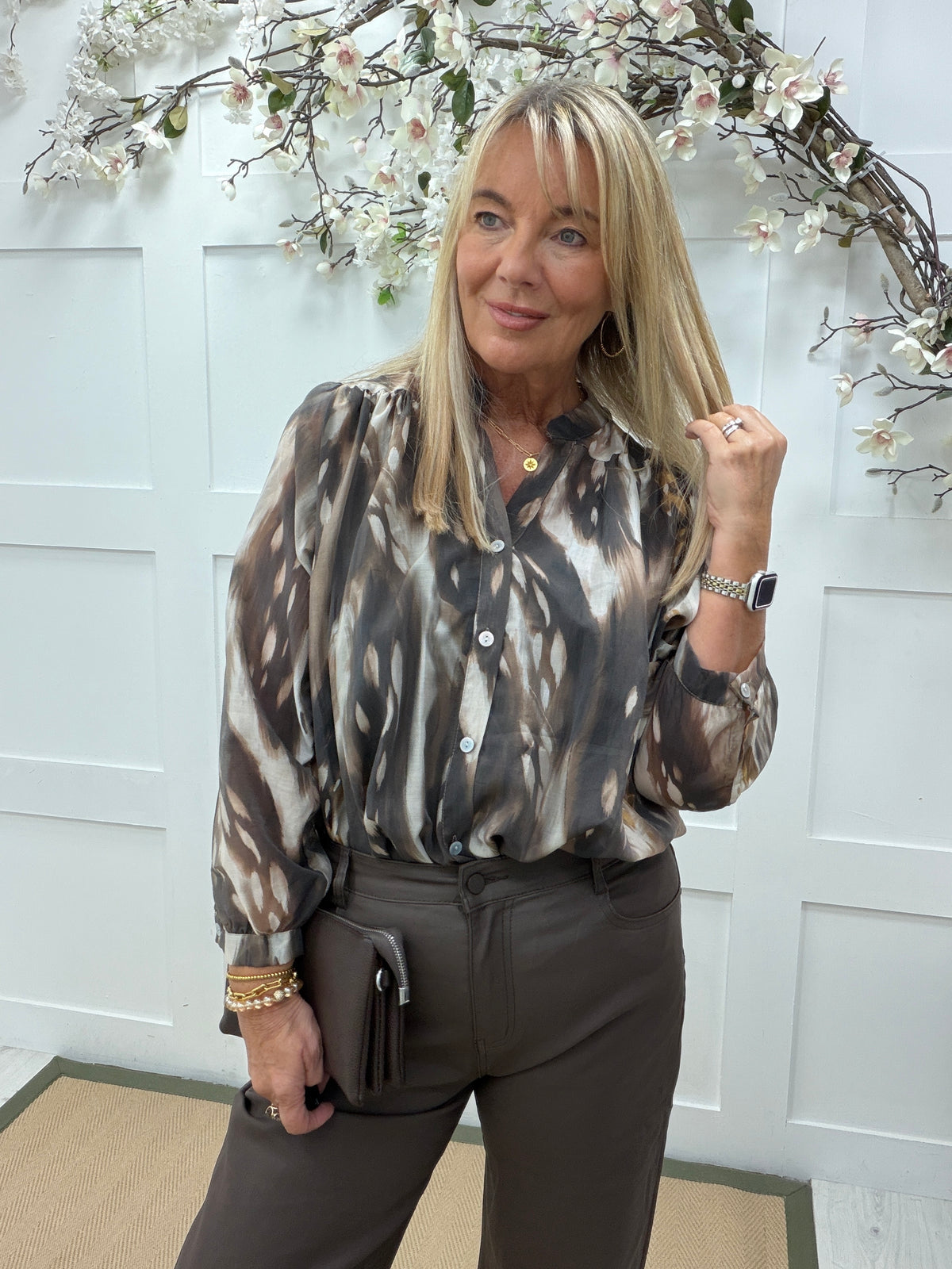 Brea: Brown animal print sheer blouse. One size: 12-18
