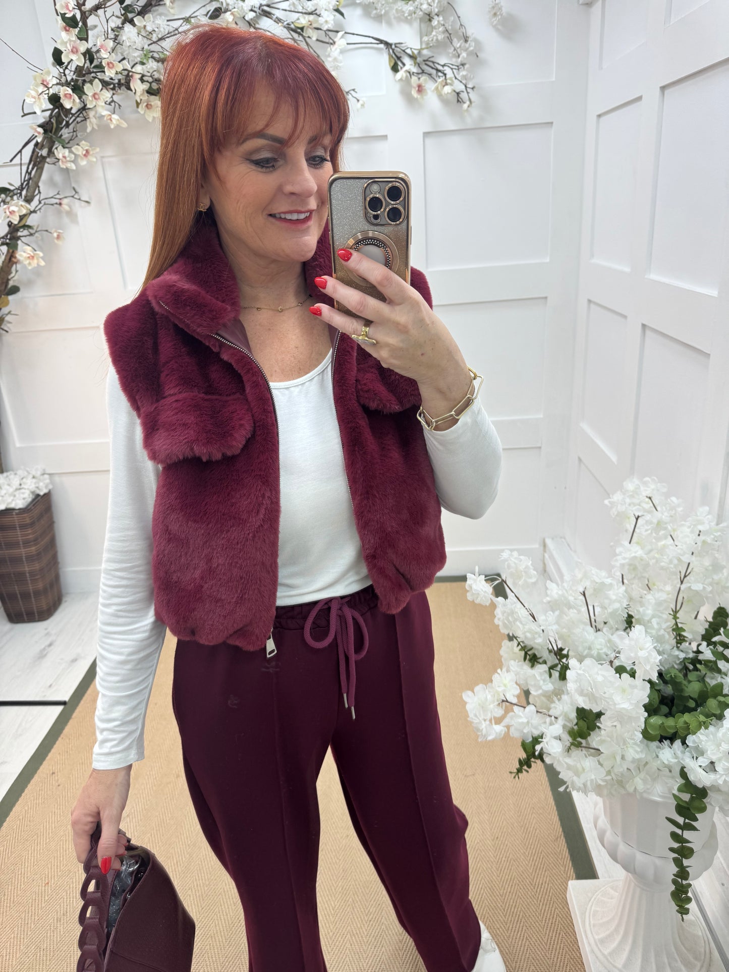 Effie: Burgundy teddy bear faux fur gilet. One size 8-14