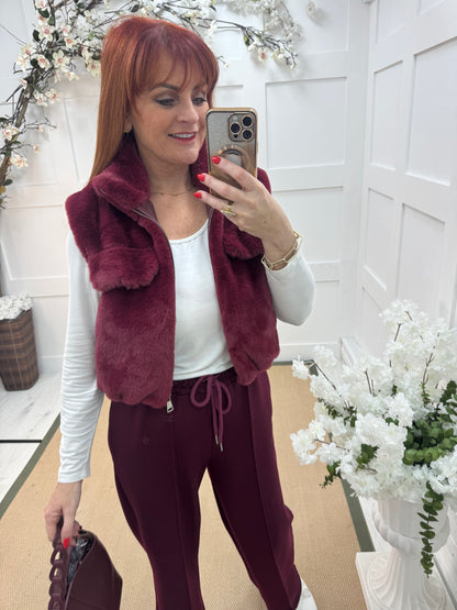 Effie: Burgundy teddy bear faux fur gilet. One size 8-14