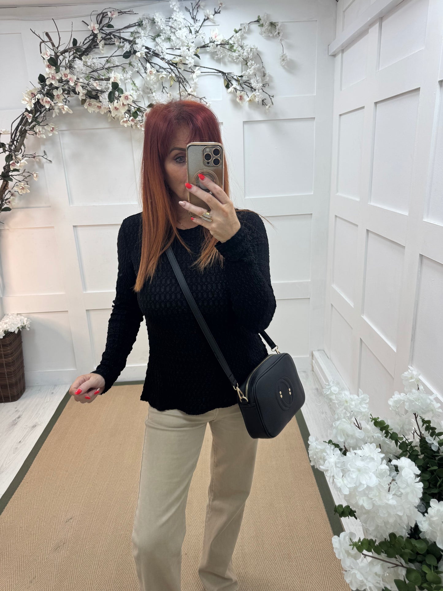 Lois: Black stretchy textured long sleeve top. One size: 12-20