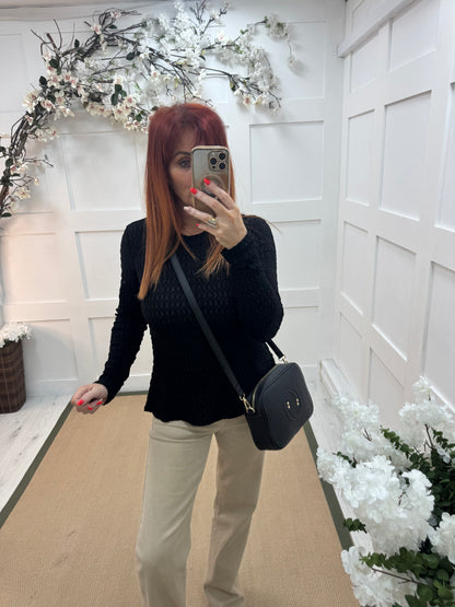 Lois: Black stretchy textured long sleeve top. One size: 12-20